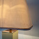 Hollywood Regency lamp in metal and brass from the 70s.