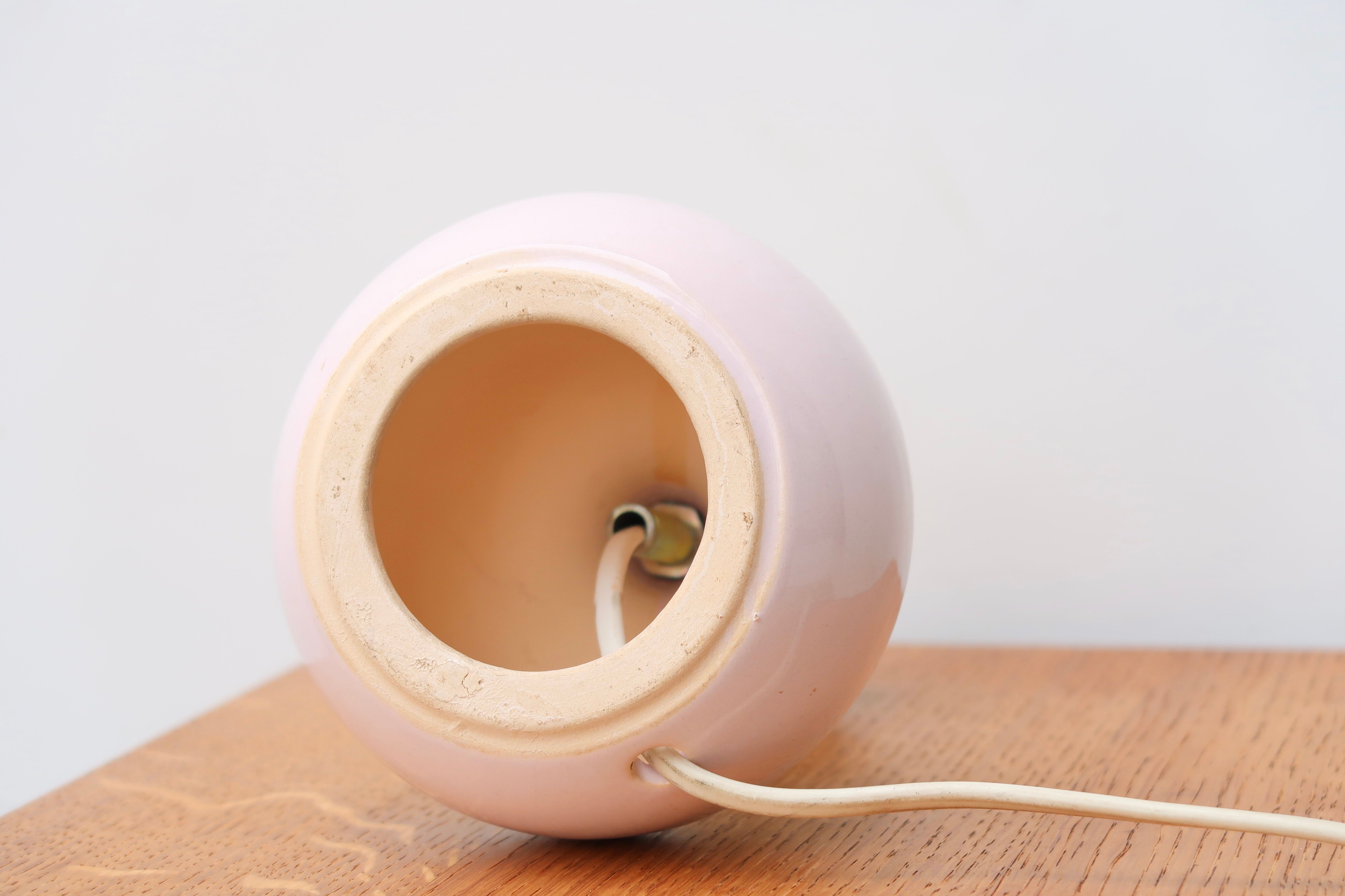 Pale pink ceramic lamp, raffia shade, 70s