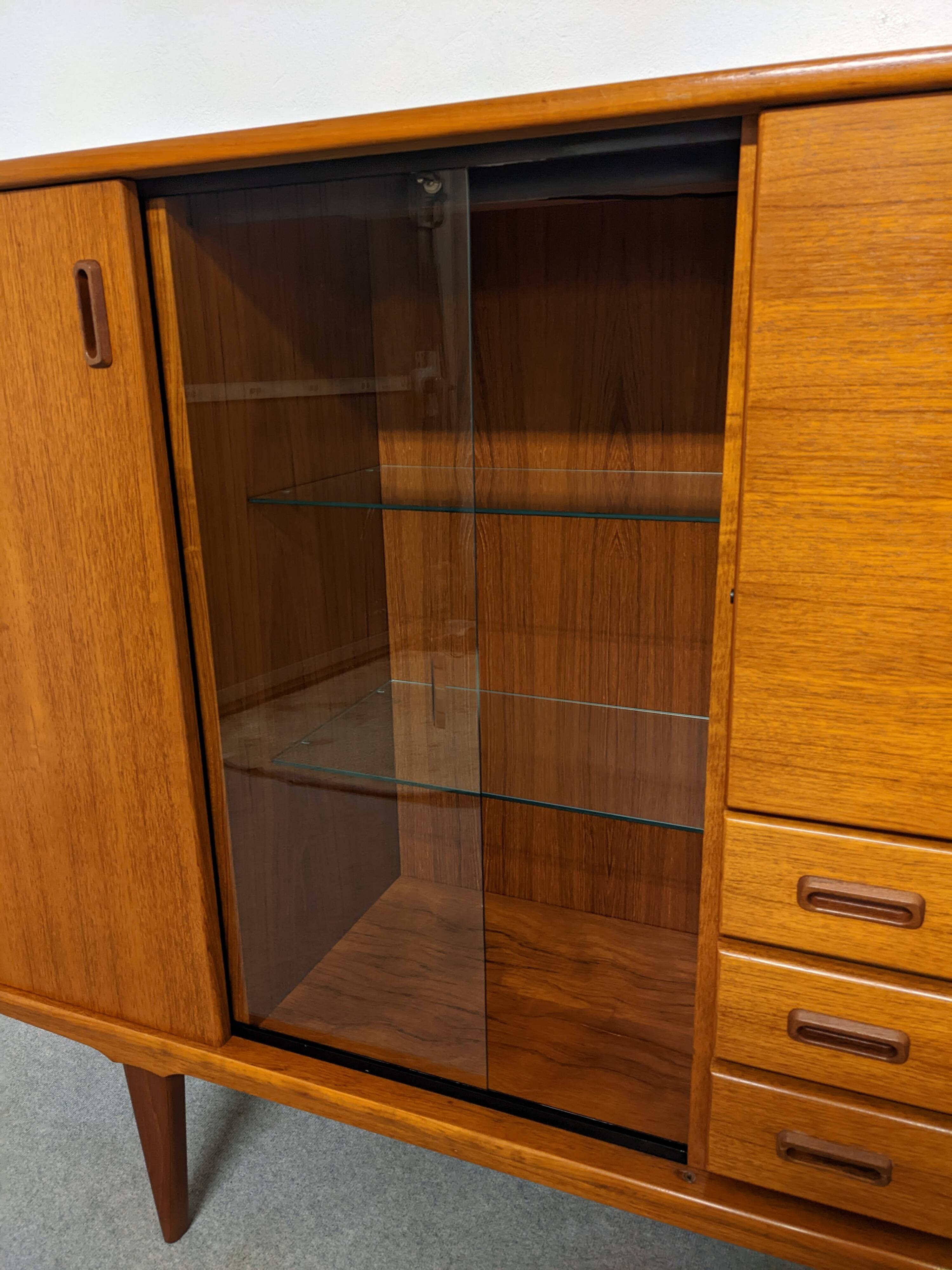 High sideboard, display cabinet and secretary, Scandinavian in teak, France around 1960.