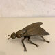 Mouche cendrier en métal doré