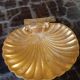 Vintage gilded bronze shell or shell pocket emptier