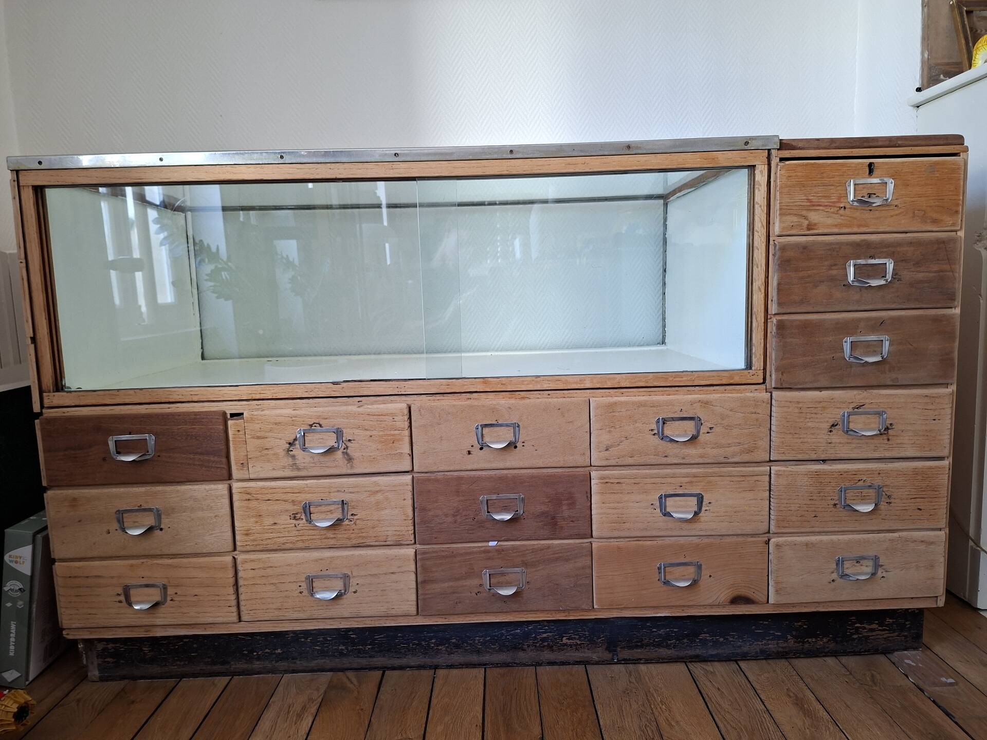 Old workshop furniture (hardware) with drawers from the early 20th century.