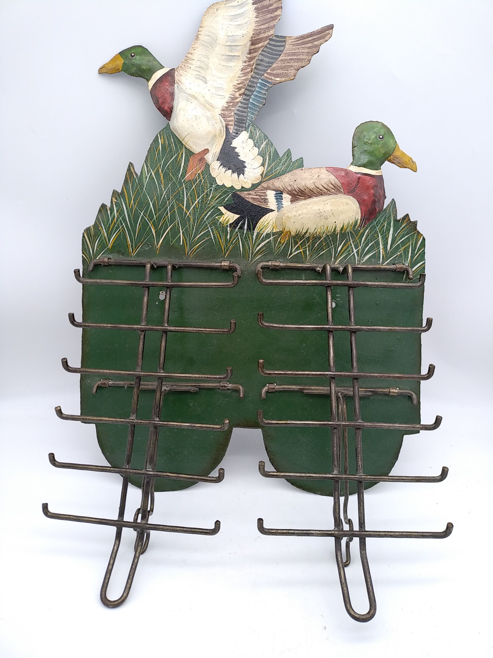 Metal wall tie door with duck decoration. 50s .