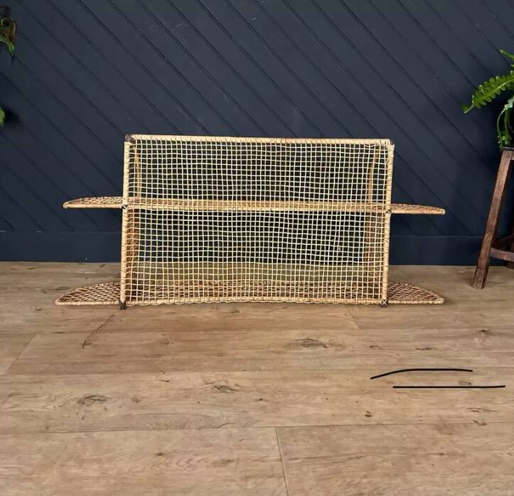 Steel and wicker wall shelf
