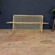 Steel and wicker wall shelf