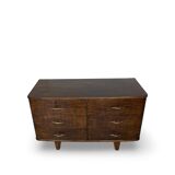 A vintage Italian chest of drawers, made of veneered walnut and solid wood,