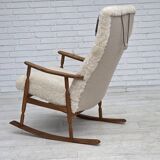 1970s, Danish rocking chair, reupholstered in quality genuine sheepskin.
