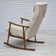 1970s, Danish rocking chair, reupholstered in quality genuine sheepskin.