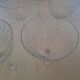 9 crystal water glasses from Baccarat Magenta Grain De Riz, height 15.5 cm.