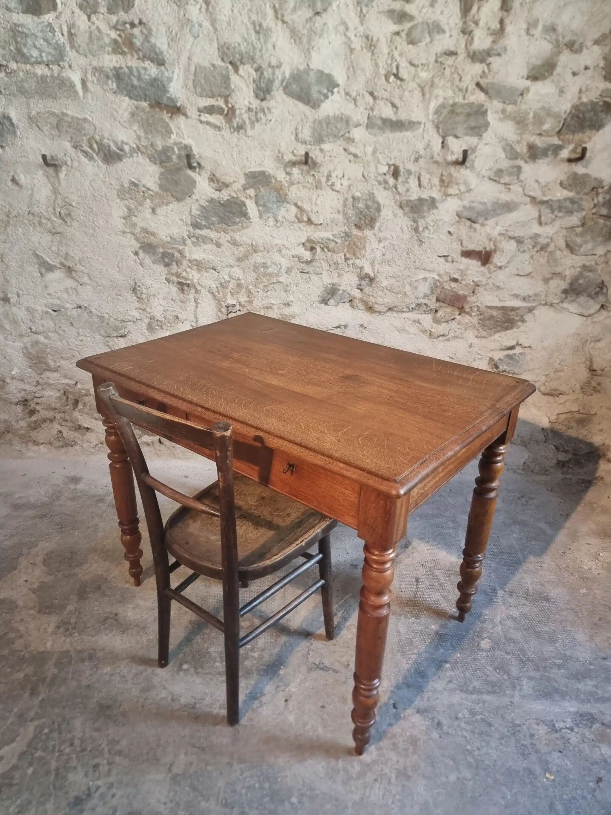Antique French oak writing desk with 2 lockable drawers, circa 1920.