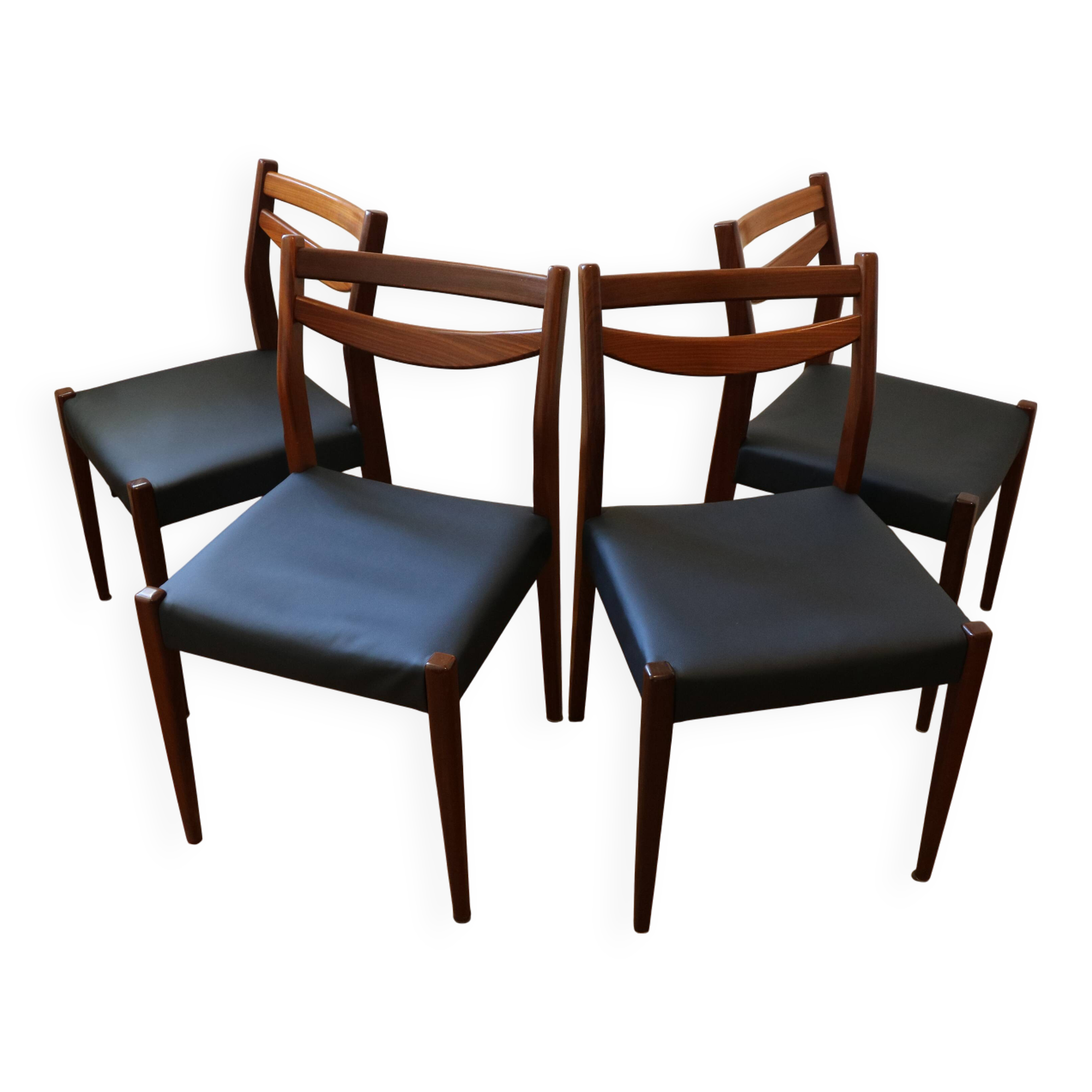 4 Scandinavian chairs in wood and faux leather, 1970.