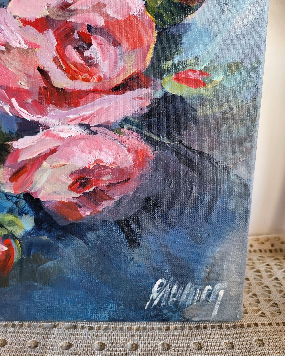 Oil on canvas painting of a bouquet of roses signed Paumier.