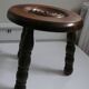 Two milking stools in the Charles Dudouyt style.