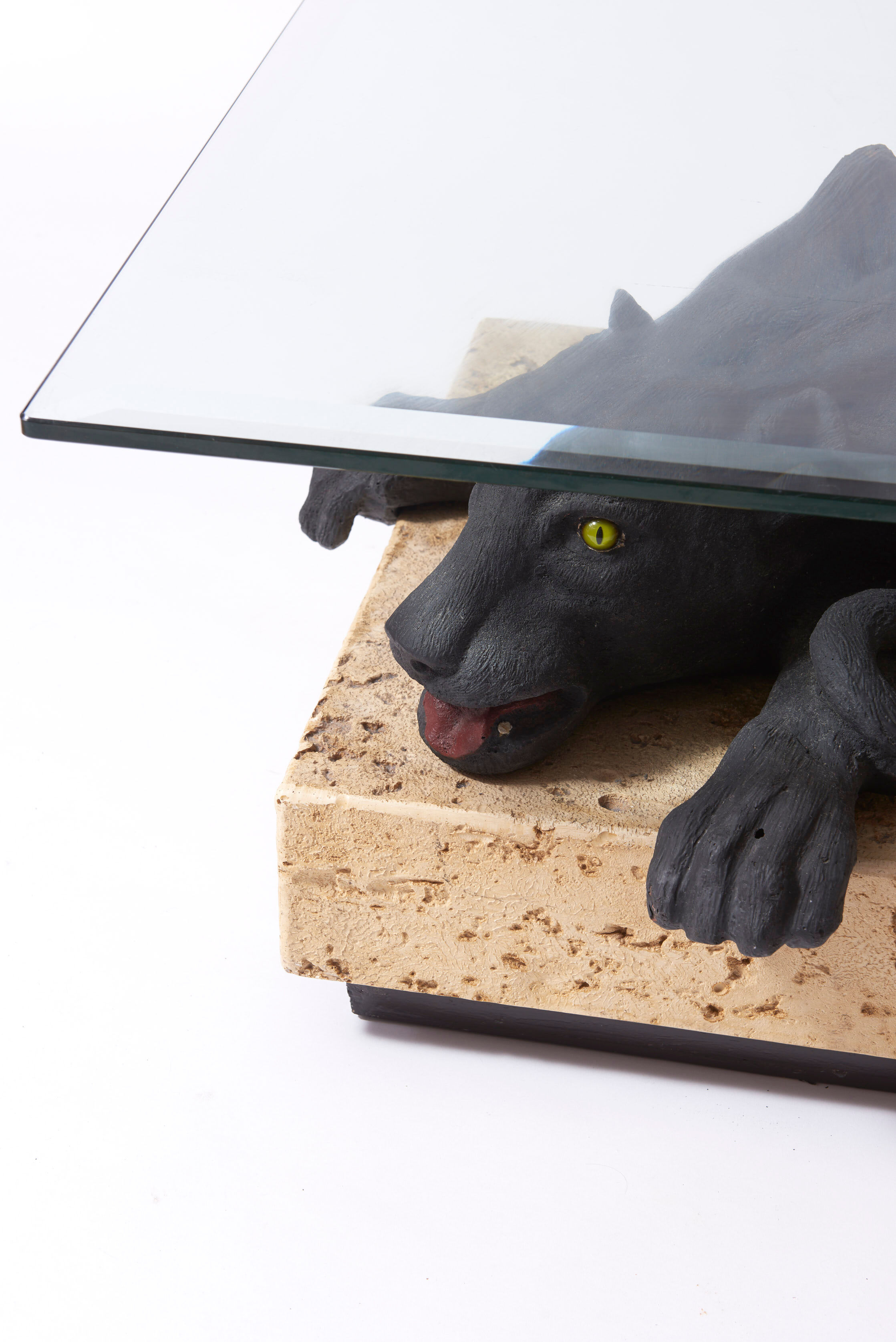 Panther coffee table on stone base and glass tablet