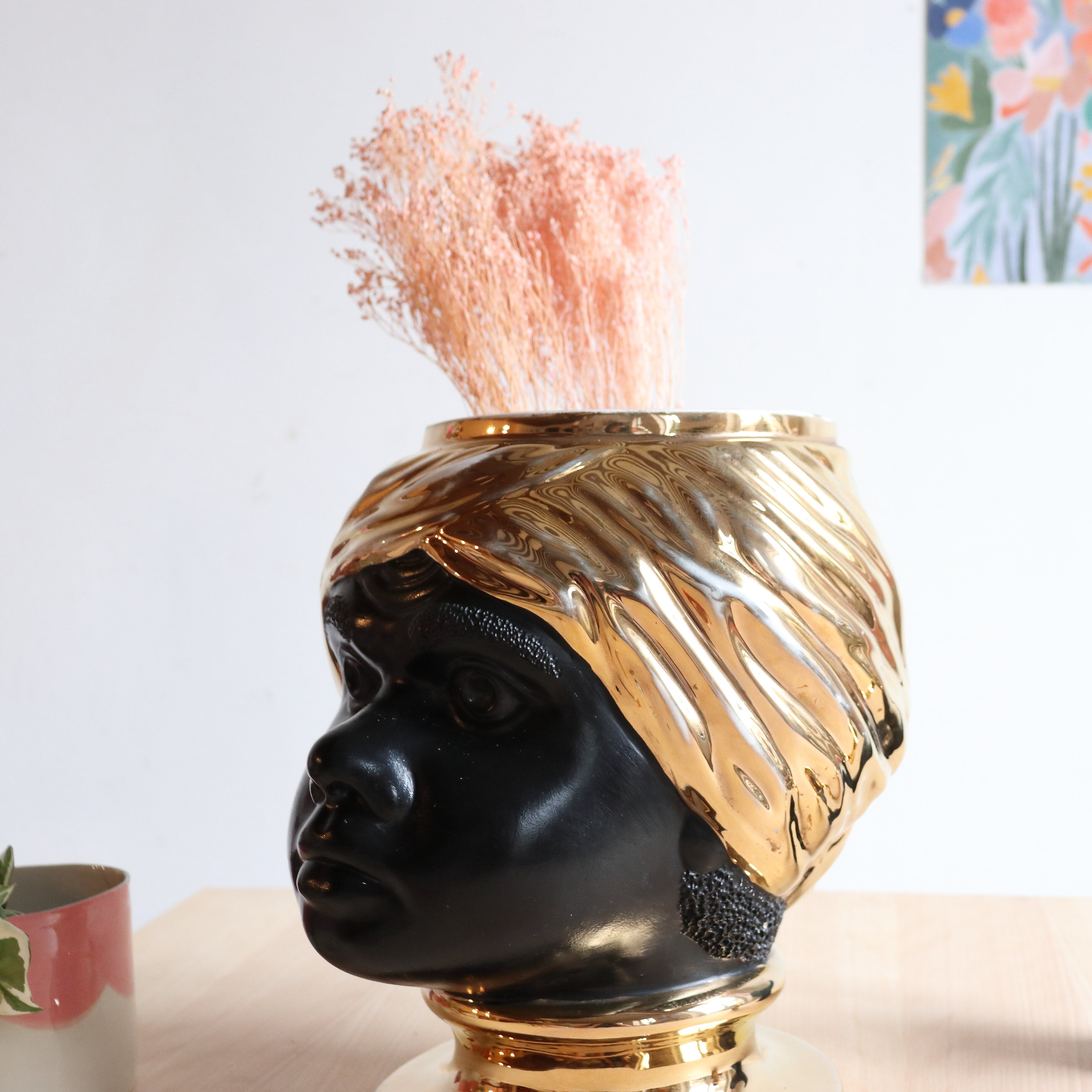 Black and gold Italian ceramic head vase signed Behreno