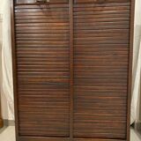 Double curtain cabinet