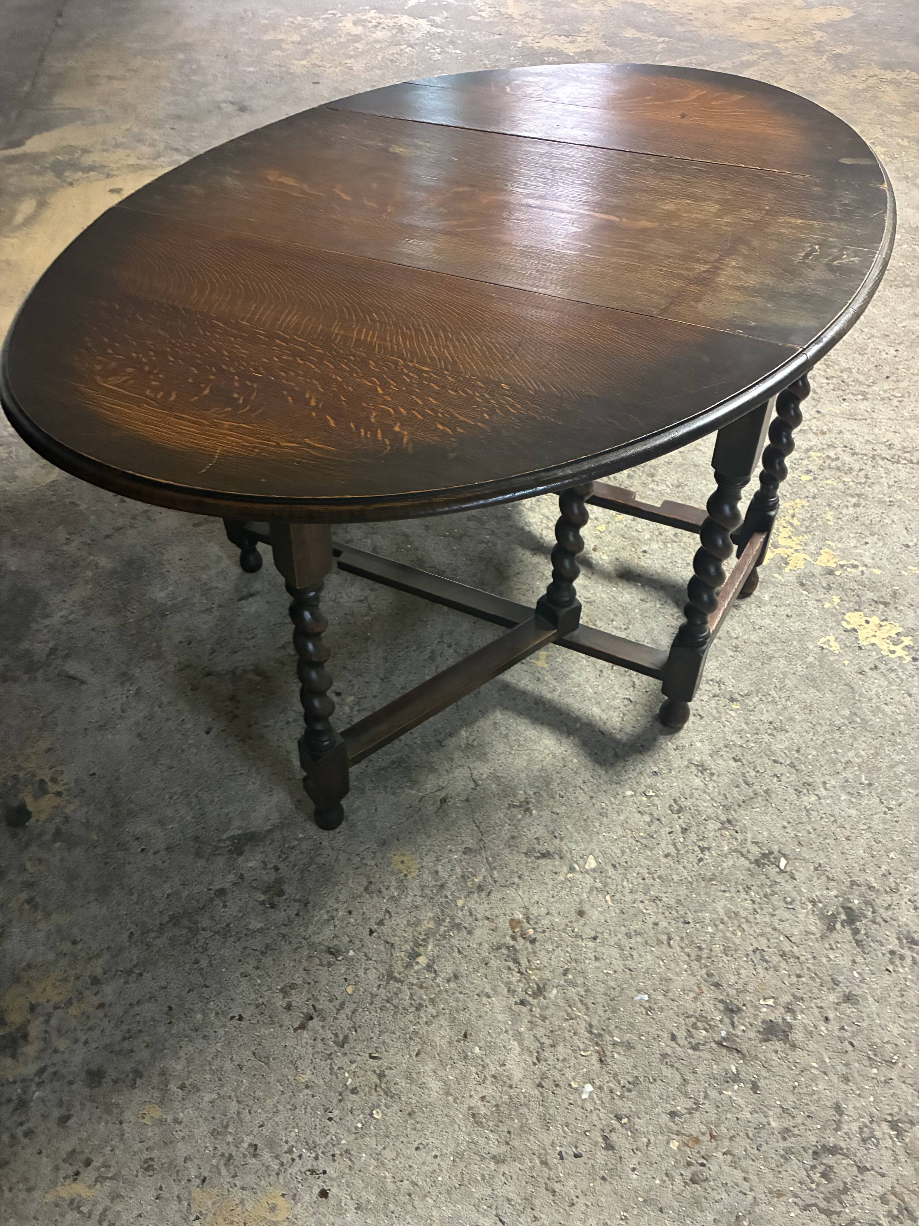 Folding wooden table with twisted legs