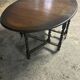 Folding wooden table with twisted legs