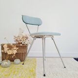 Old chrome metal and blue velvet chair