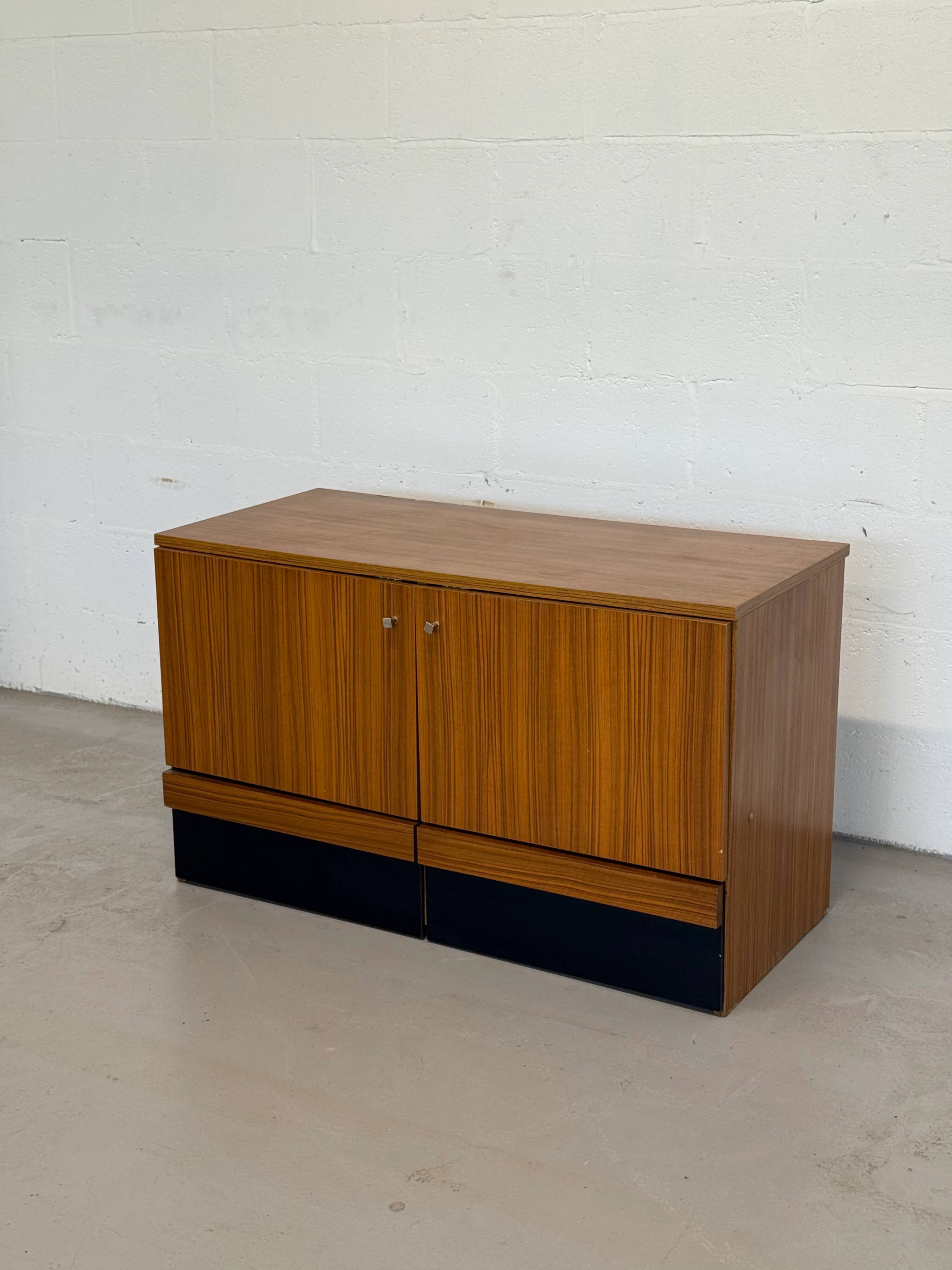 Vintage teak sideboard, mid-century style, with doors and drawers.