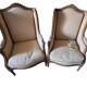 Pair of restored Louis XV wingback armchairs – new fabric