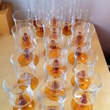 Service of 18 glasses with amber feet 70s
