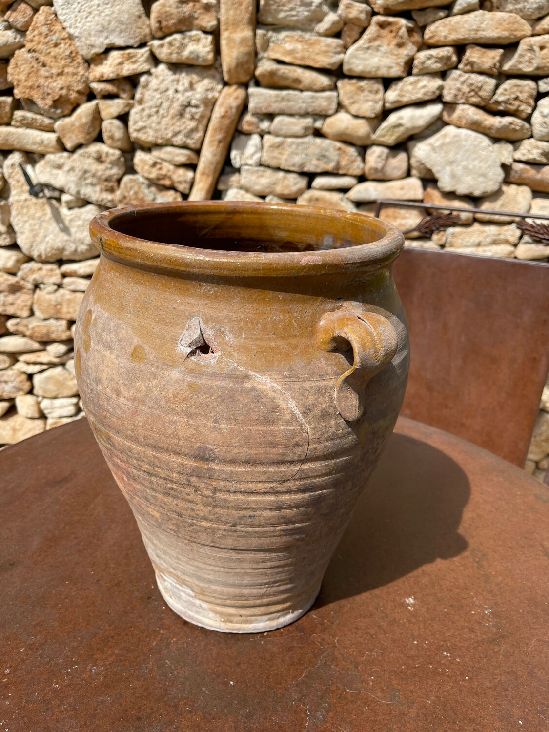 Ancient terracotta pottery jar