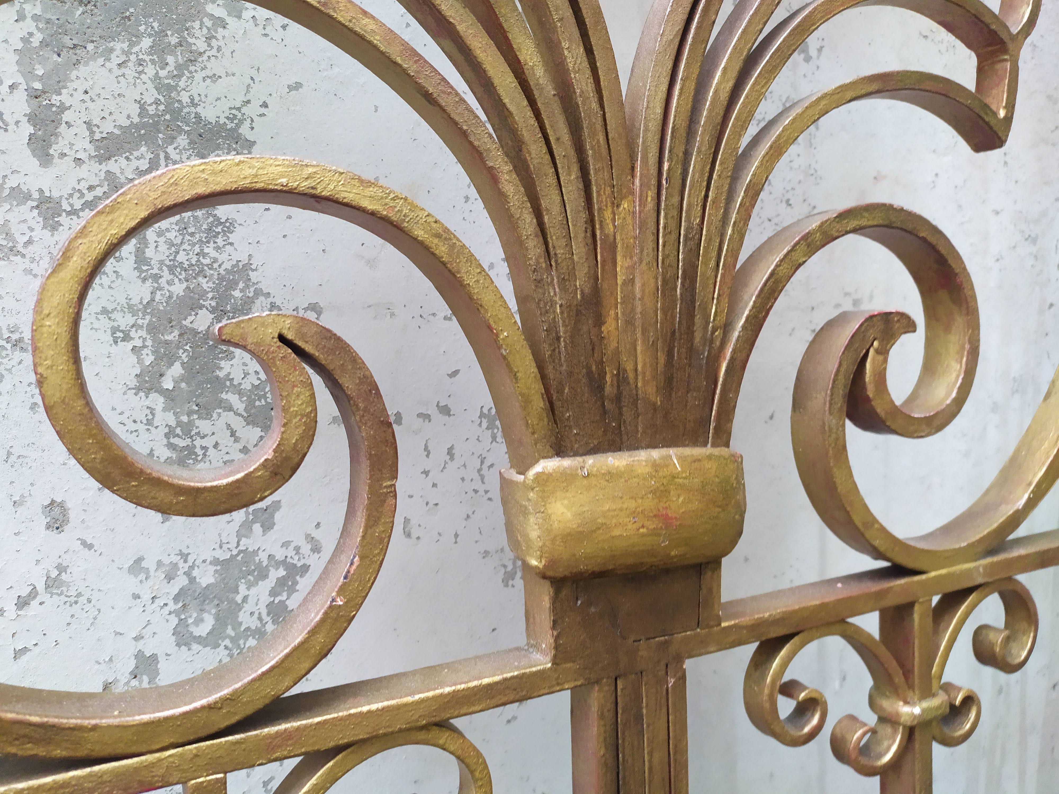 Golden wrought iron bedhead