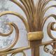Golden wrought iron bedhead