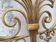 Golden wrought iron bedhead