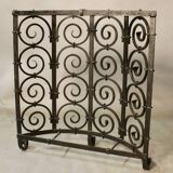 Grille de cheminée en fer forgé
