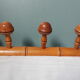 Bamboo-like wall coat rack with 5 mushroom hooks