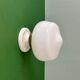 Vintage Art Deco globe wall light in white opaline.
