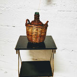 Demijohn dressed in wicker
