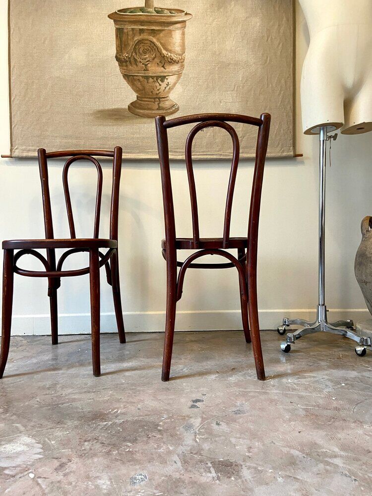 2 bistro chairs in arched and dark wood