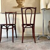 2 bistro chairs in arched and dark wood