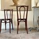 2 bistro chairs in arched and dark wood