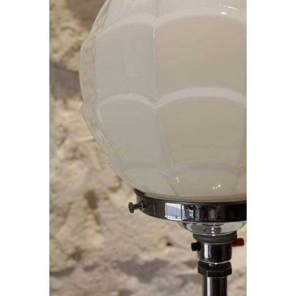 Chrome metal lamp with glass globe, Art Deco style, 20th century period.