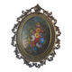 Painted under glass convex medallion in bronze