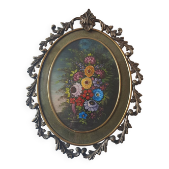Painted under glass convex medallion in bronze