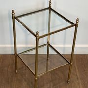 Pair of brass side tables attributed to Maison Jansen