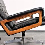 Armchair and footstool by André Vandenbeuck for Strässle in black leather