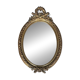 19th century oval gilded mirror, torch & quiver 106cm