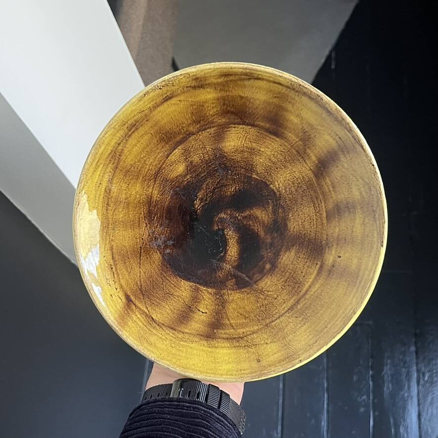 Yellow ceramic plate by Georges Jouve