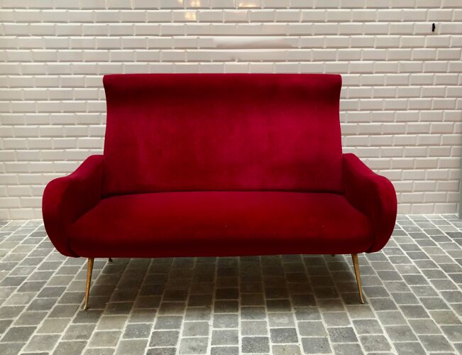 Italian red velvet armchair with brass legs
