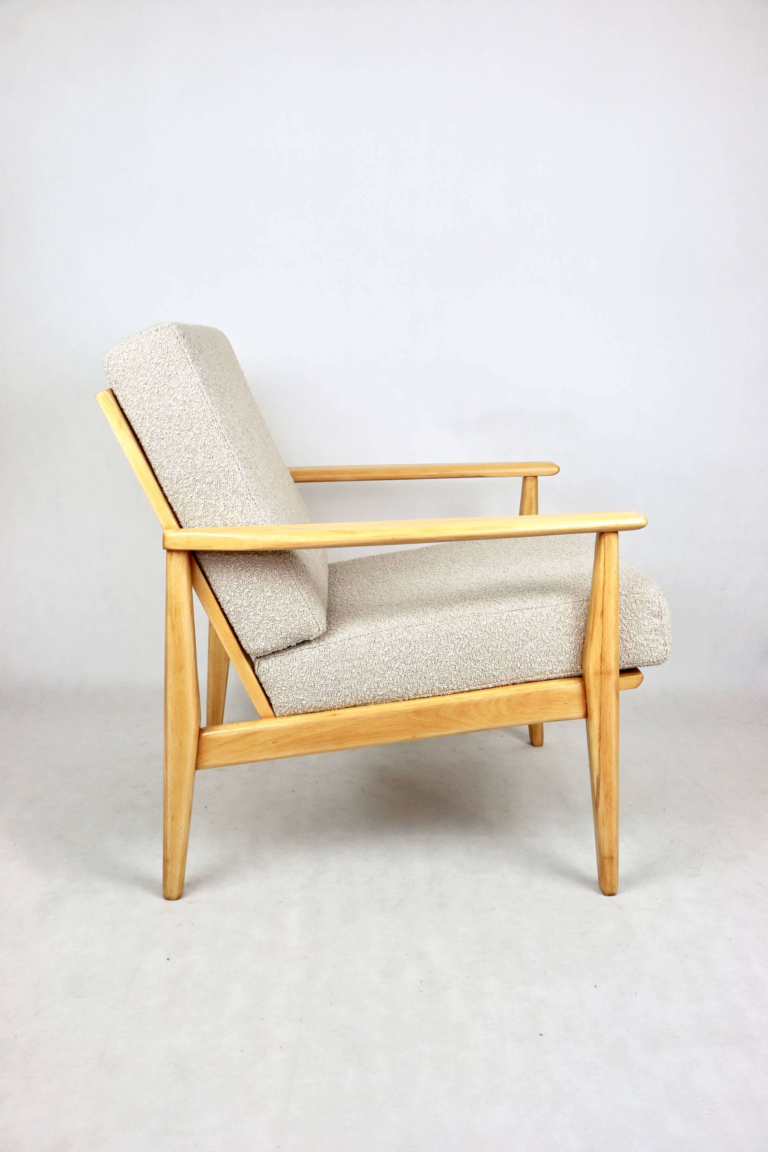 Vintage Danish armchair, 1970s, beige boucle - light wood - 2 pieces available
