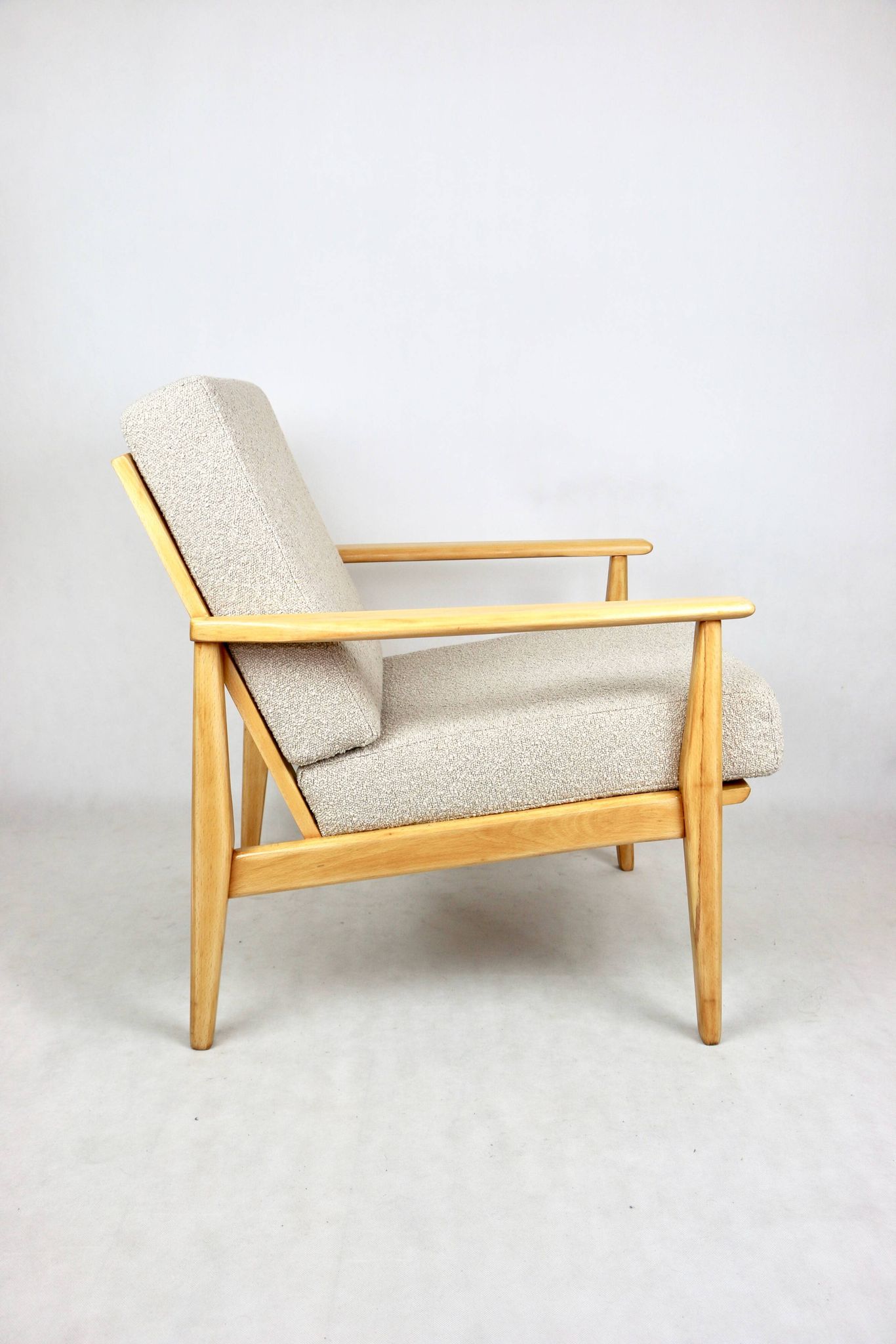 Vintage Danish armchair, 1970s, beige boucle - light wood - 2 pieces available