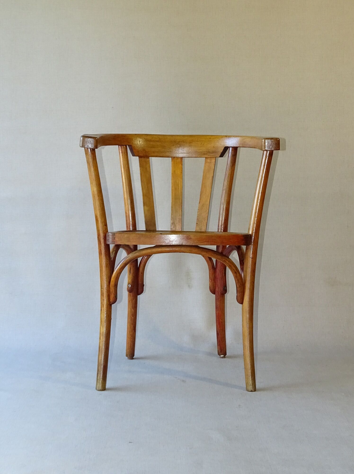 Fauteuil de bureau, bois blond, vers 1930, assise bois