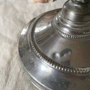Antique jeweller's lamp, silver-plated base, frosted pink glass shade.