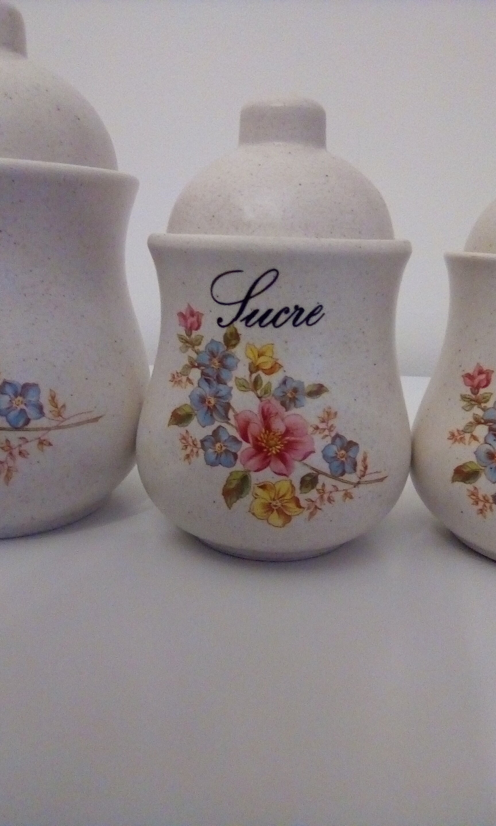 Series of 4 kitchen pots - floral motif